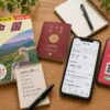 中国旅行の準備に必要なパスポート、ガイドブック、スマートフォン、eSIMを並べた出発前の準備風景